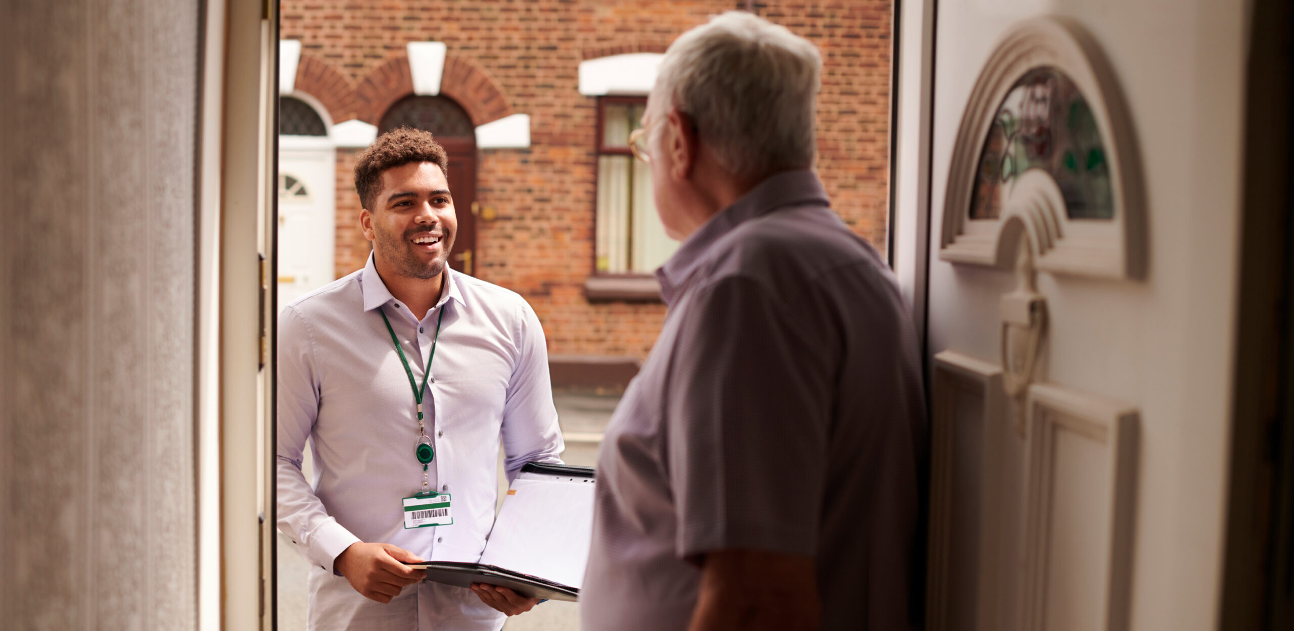 male health care provider and paperwork